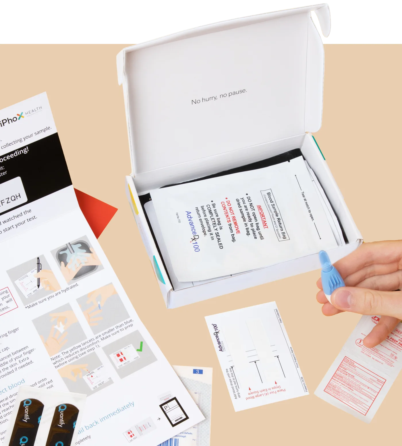 Genuine SiPhox ADx setup with numbered collection card, lancet, instructions and sample return bag